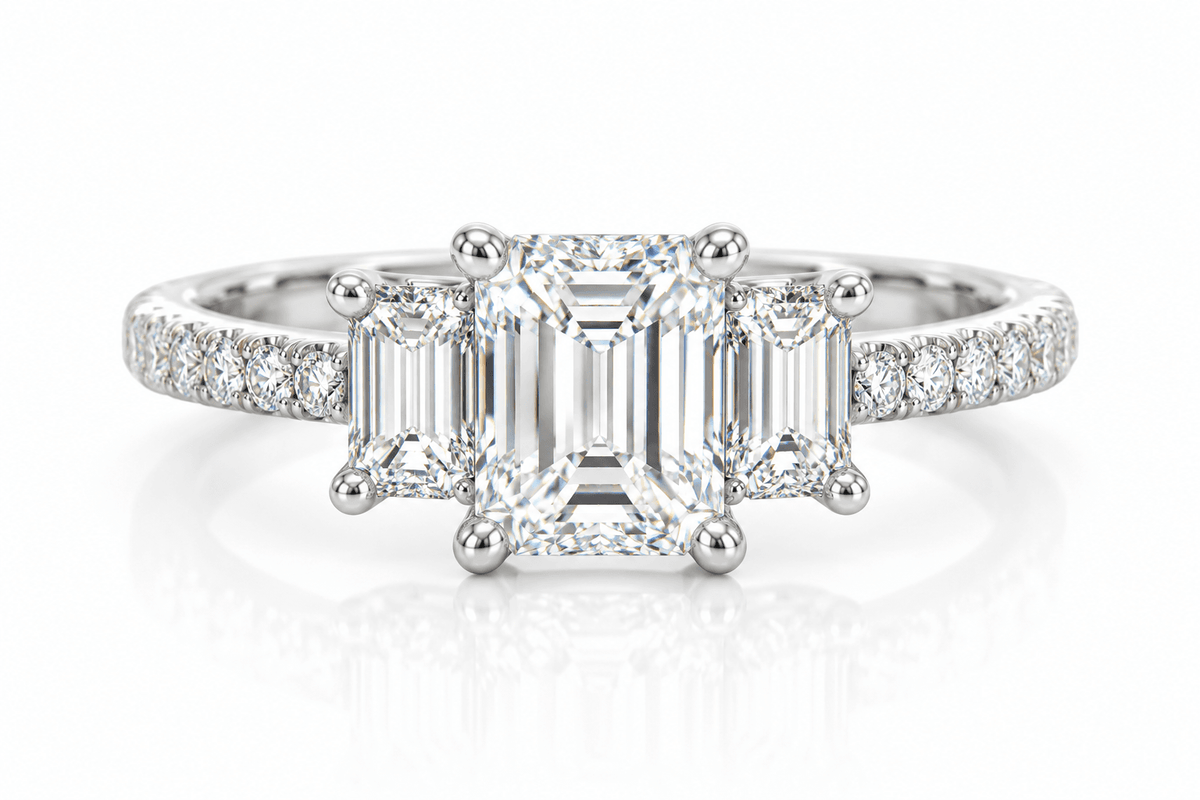 14KW 1.01 CT E VS1  GIA#2207682569 Natural Emerald Cut, 2X EC 0.52ctw, 12X RB 0.11ctw