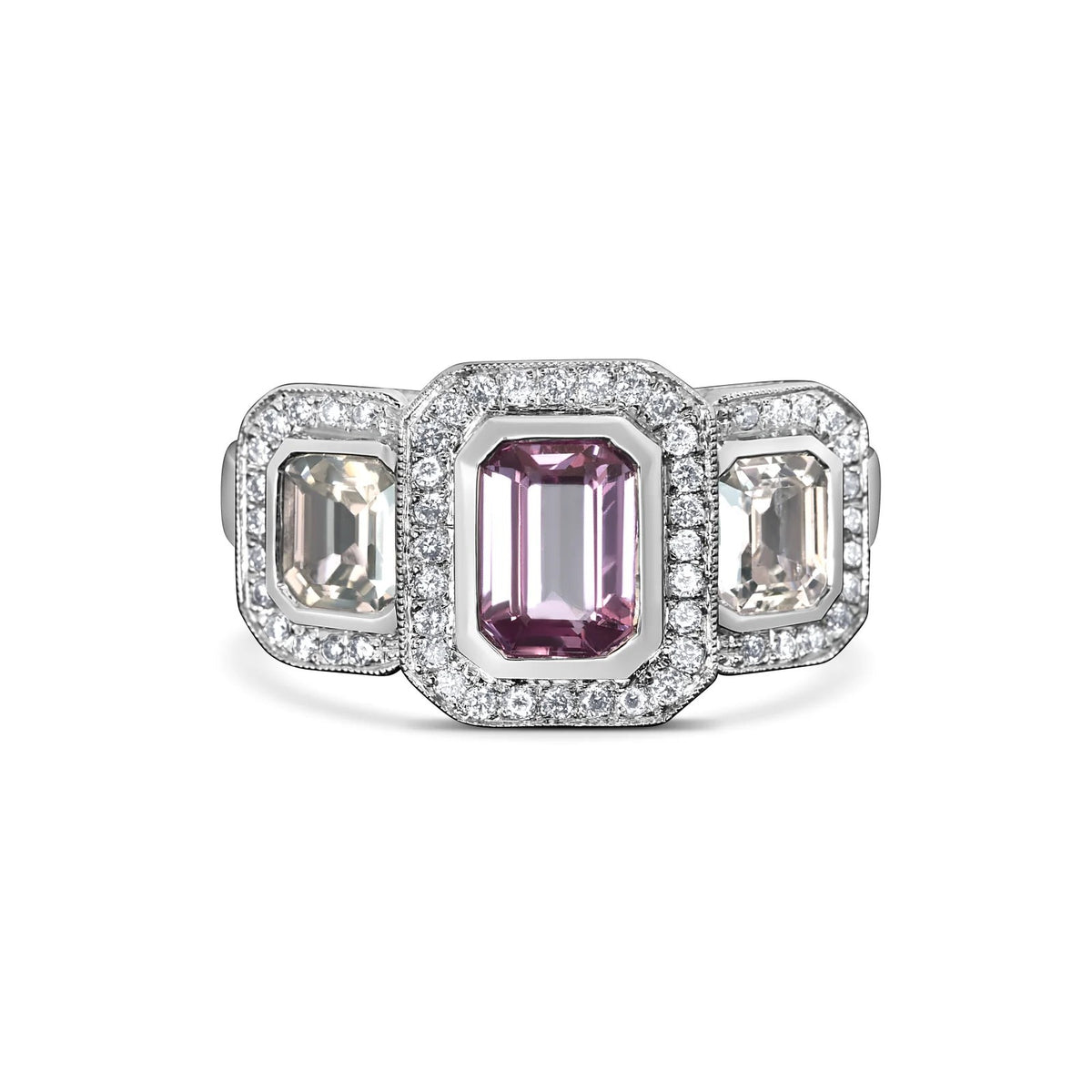 Pink sapphire ring with white sapphires and diamonds in 14kt white gold
