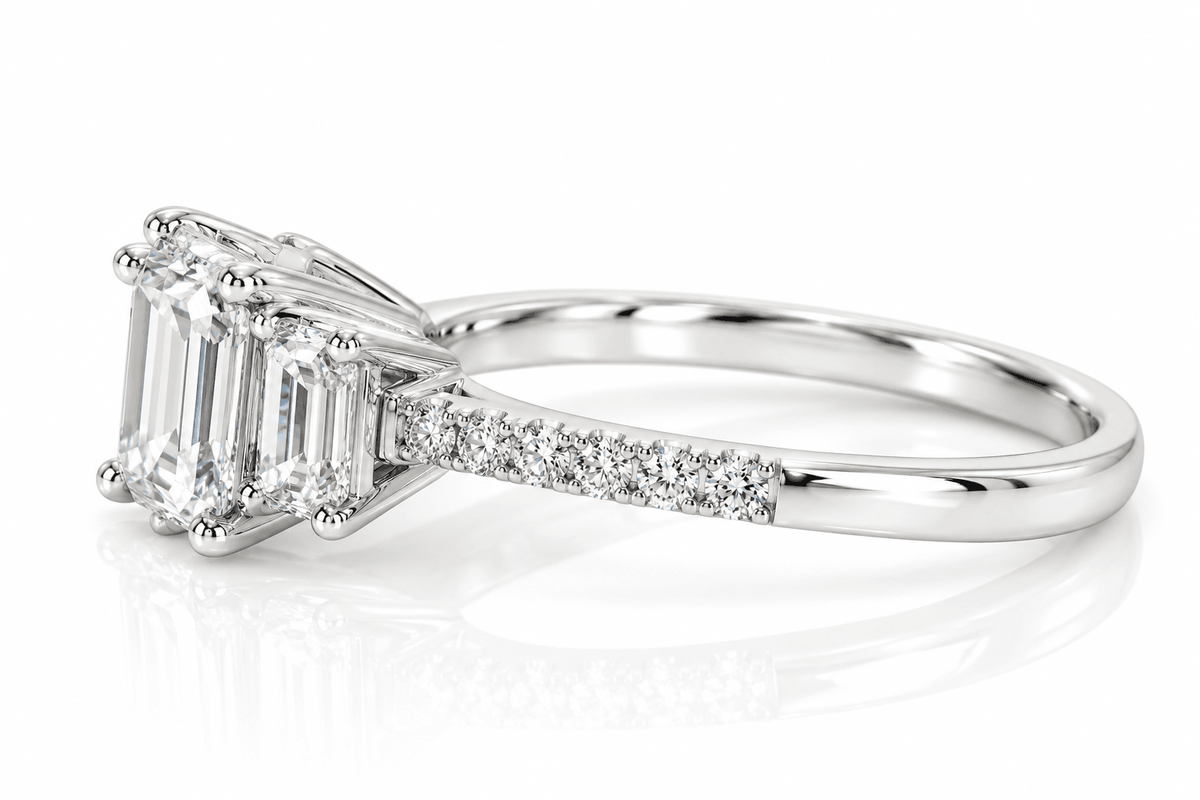 14KW 1.01 CT E VS1  GIA#2207682569 Natural Emerald Cut, 2X EC 0.52ctw, 12X RB 0.11ctw