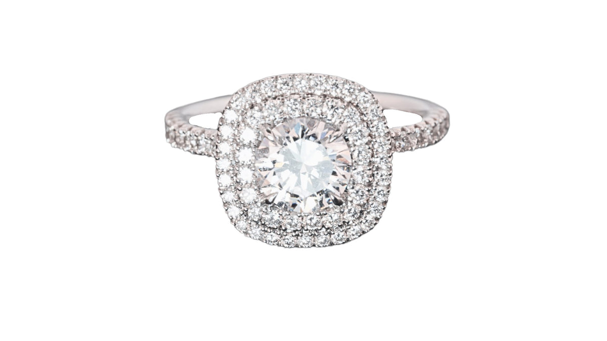 Double halo French-set diamond ring in 18kt white gold