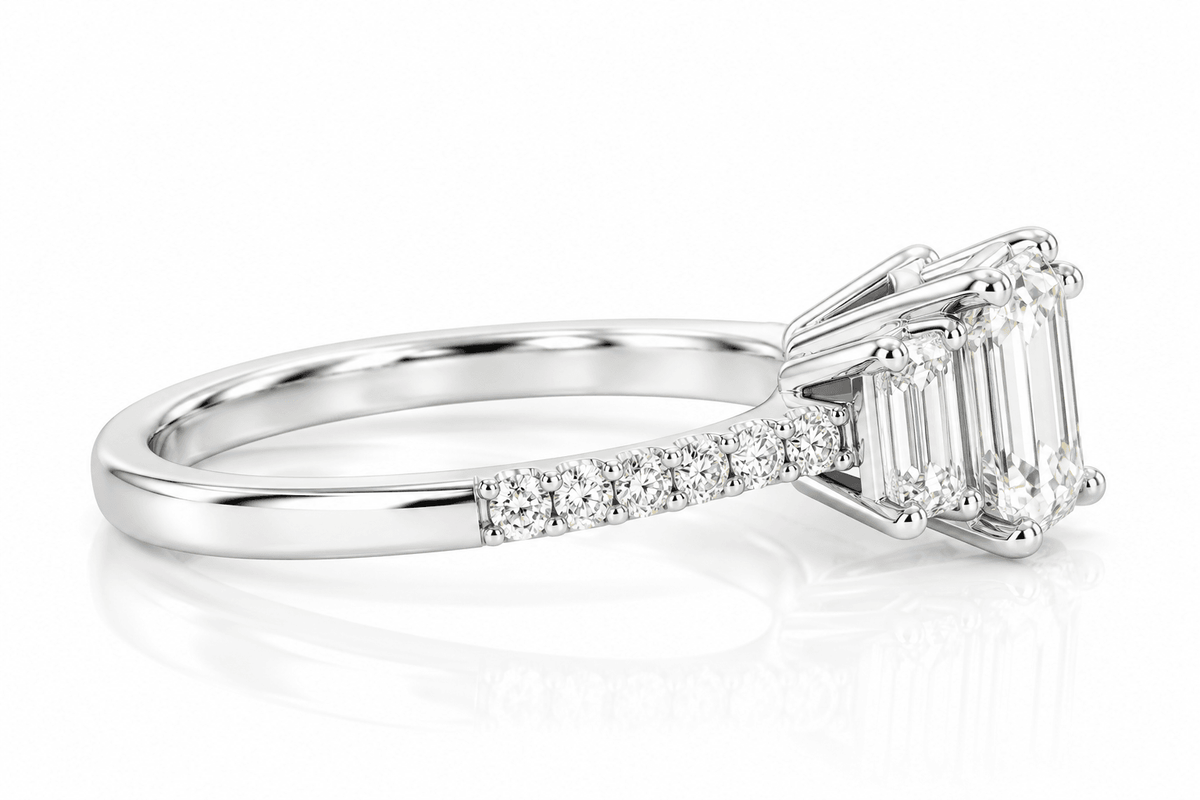 14KW 1.01 CT E VS1  GIA#2207682569 Natural Emerald Cut, 2X EC 0.52ctw, 12X RB 0.11ctw