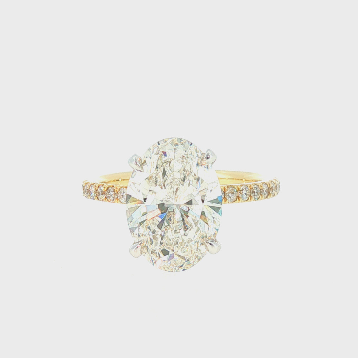 3.06ct G SI1 OVAL Lab-Grown IGI 14KT Yellow with White Prongs and 15x0.25ctw Natural G SI diamonds